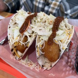 The Booyah Shed signature dishes Chicken BooyahSirloin Steak SandwichCod Fish Taco